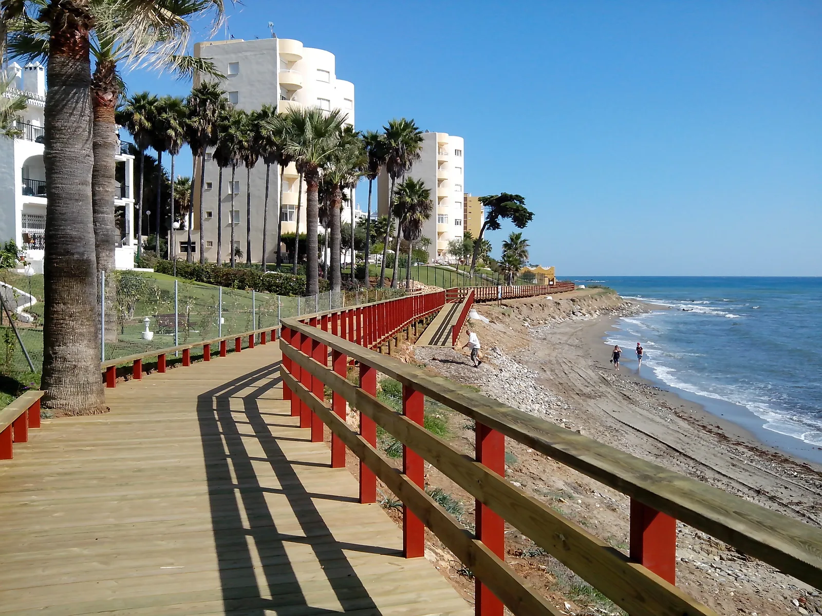 The wooden Senda Litoral boardwalk along the Mijas Costa shore