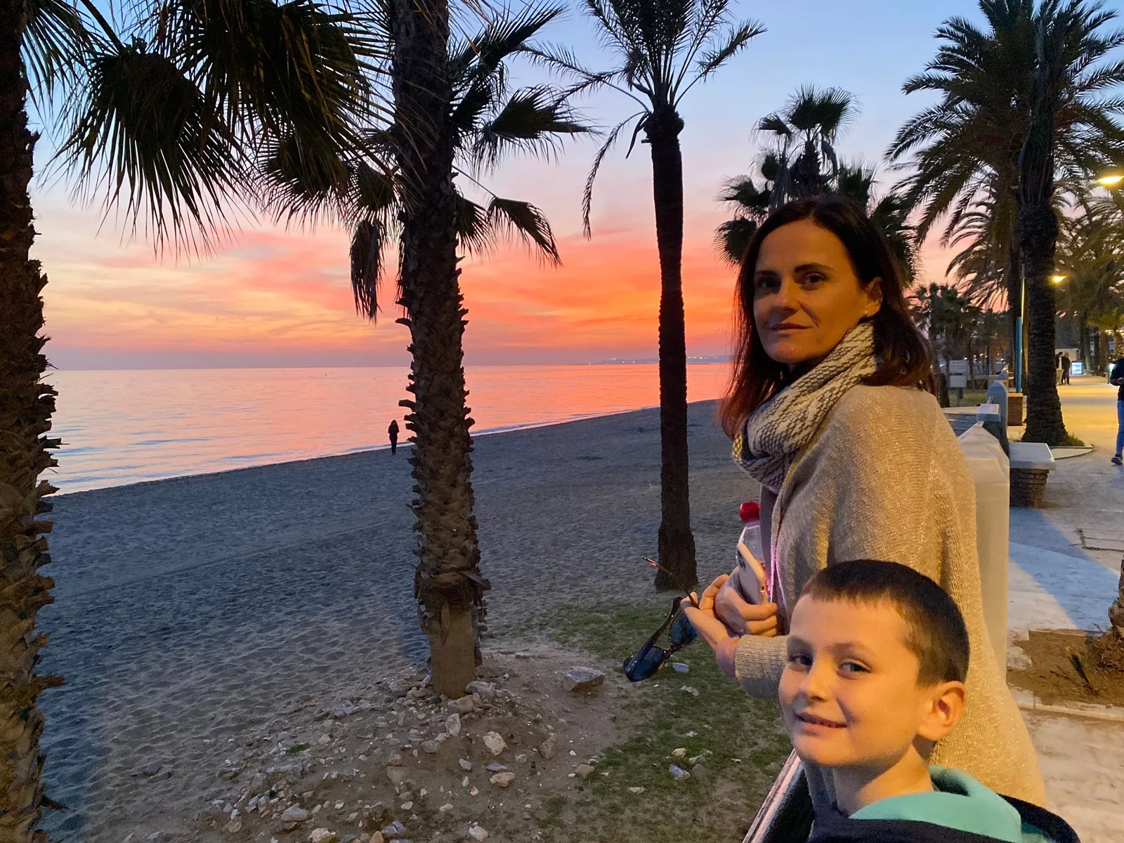 Evening stroll on the promenade at sunset