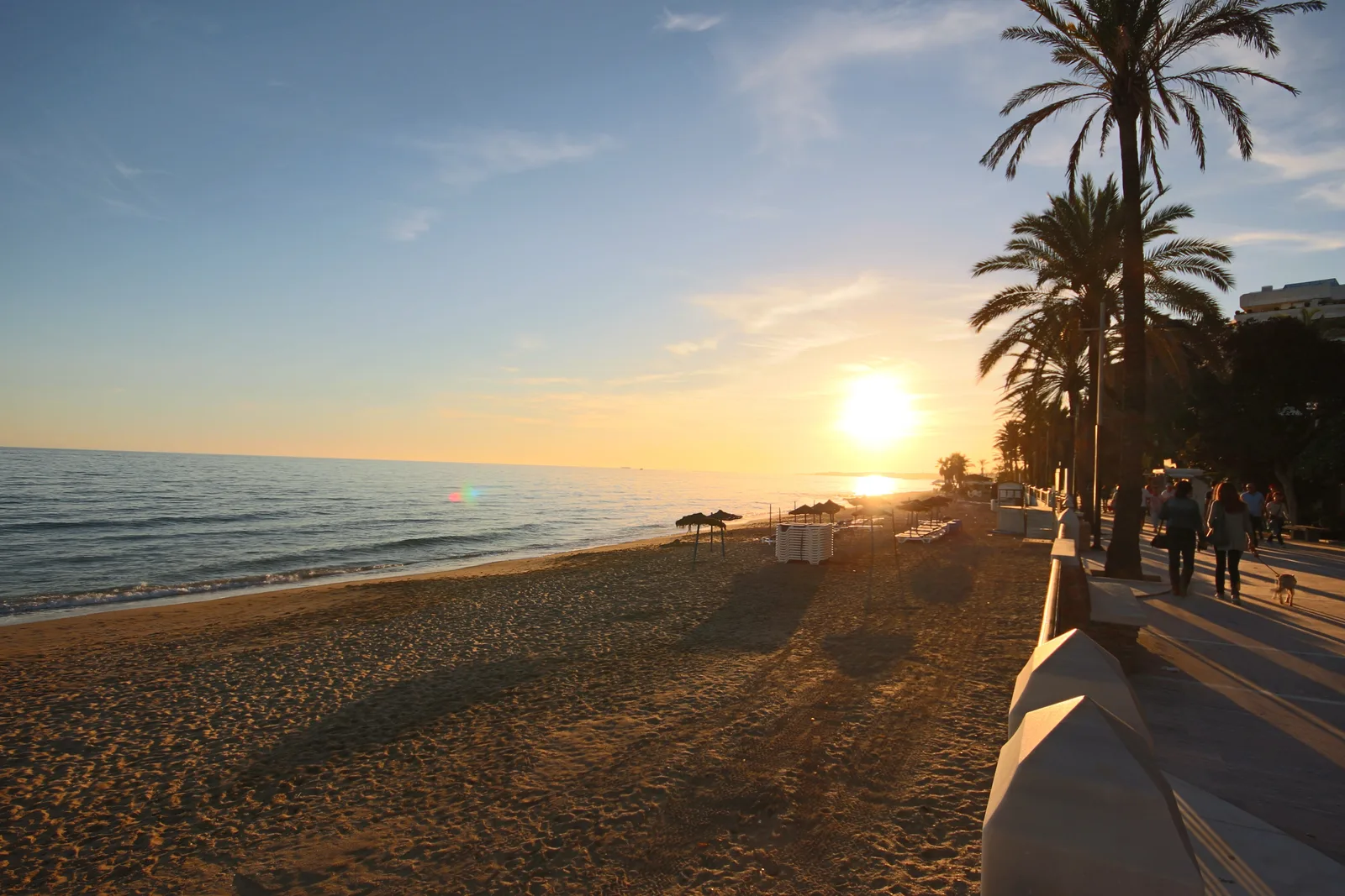 Sunset along the beach from the promenade