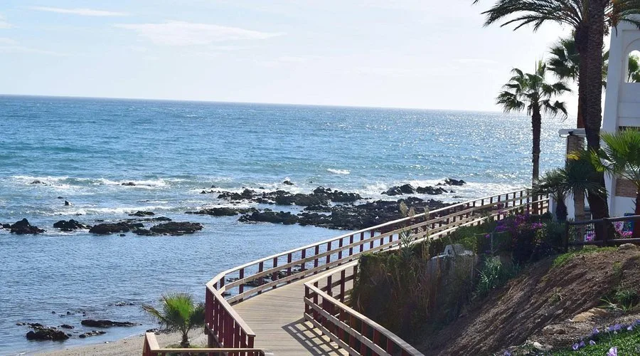 The Senda Litoral boardwalk in daytime sunshine
