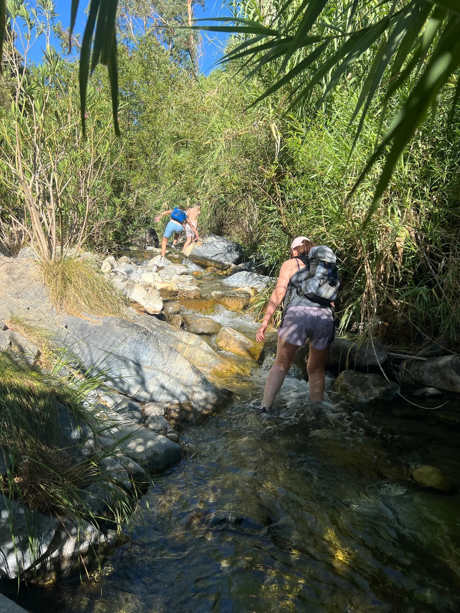 Wading up the river between the pools