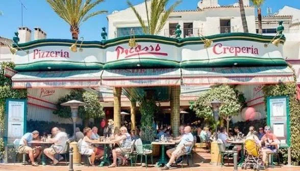 The Picasso terrace facing the marina