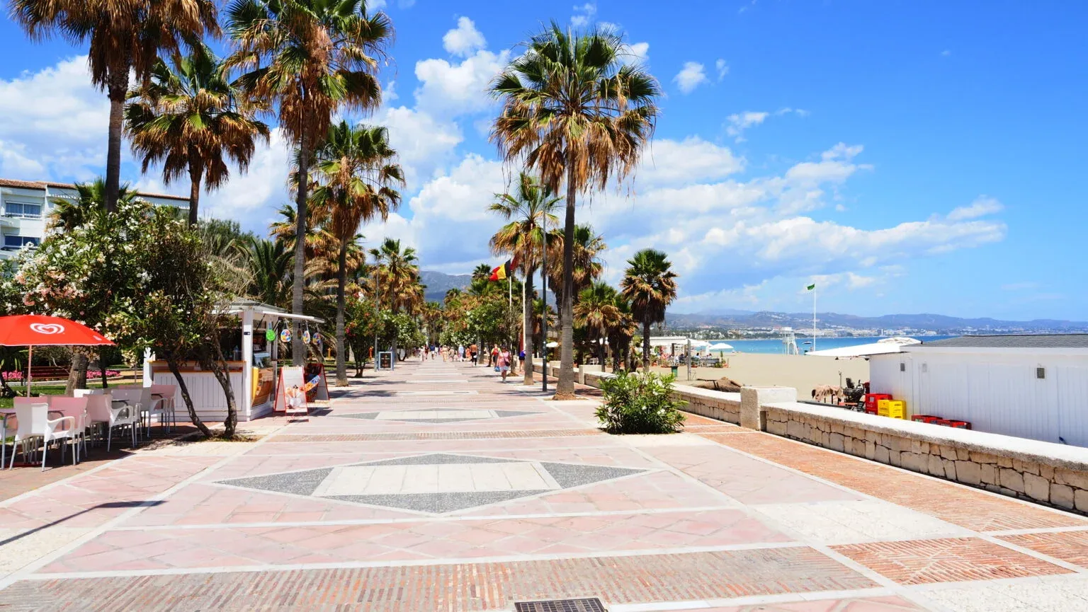 The palm-lined promenade in the morning sun